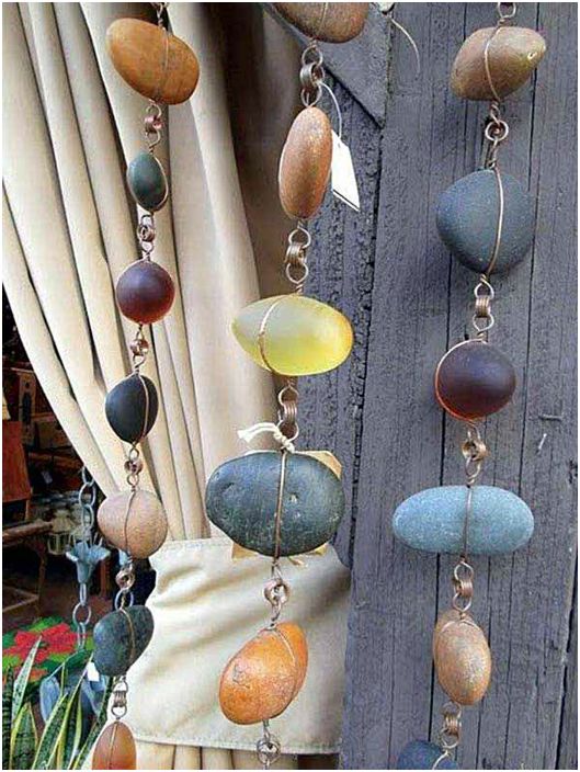 Fantastic garlands of small river stones and wire.