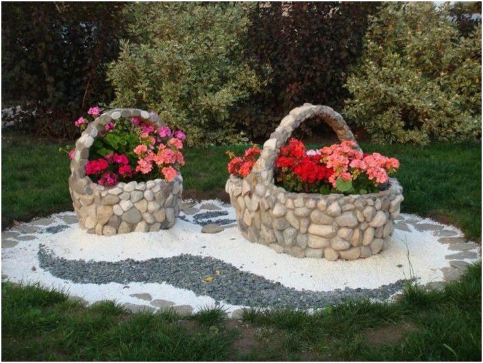 Unusual flower beds in the form of baskets.