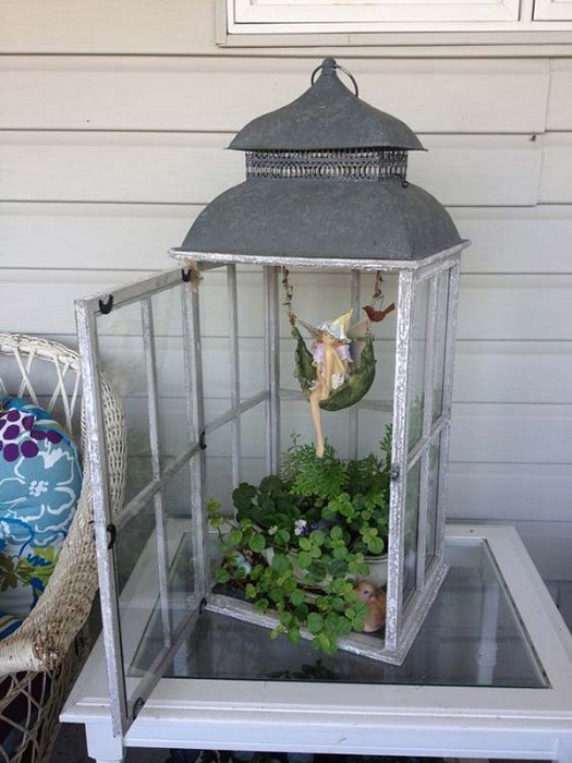 Dekoratív lámpa mini kerttel belül - kiváló megoldás a tervezési megoldásokhoz.