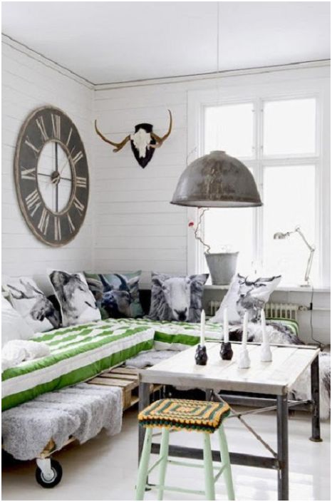 A great option to create a bed on pallets and add bright accents to the room with pillows.