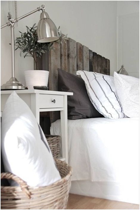 Interweaving Scandinavian style with interesting details in the decor with a bed on pallets.