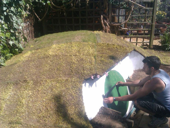 The roof is covered with turf.