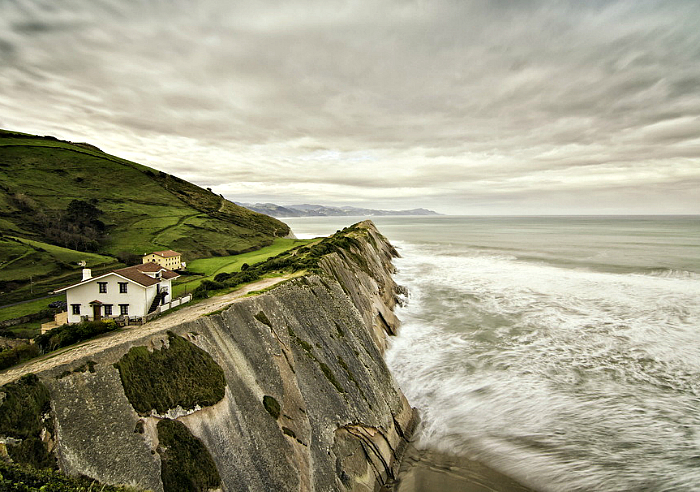 Large residential building on a cliff in Norway.