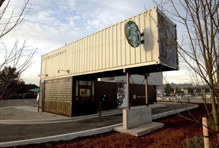 The building of a coffee shop made of shipping containers.