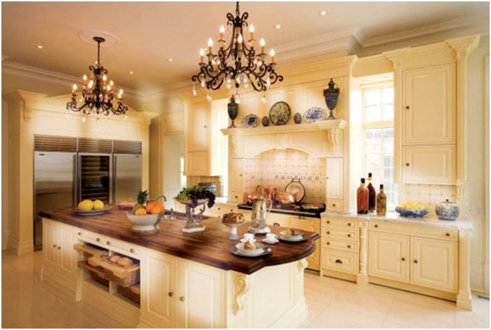 Strict, aristocratic and functional kitchen with many drawers and a large dining island table.