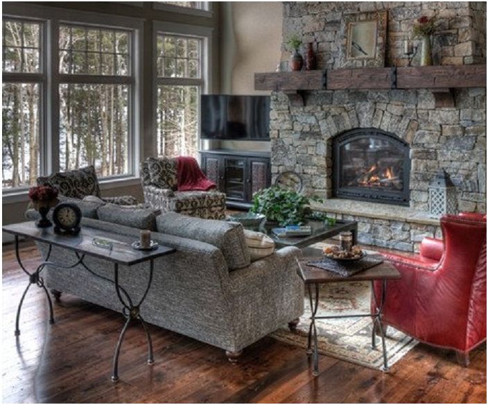 Lovely living room with built-in fireplace in gray and red tones.