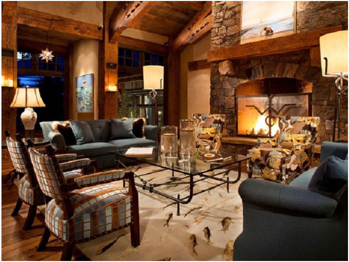 Combination of wooden interior elements with an unusual fireplace.