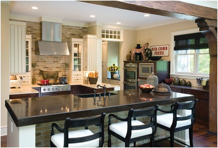 The modern chic kitchen is tastefully decorated.