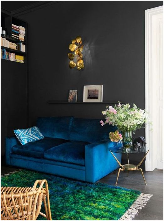 It's worth experimenting with the color of the sofa and walls.