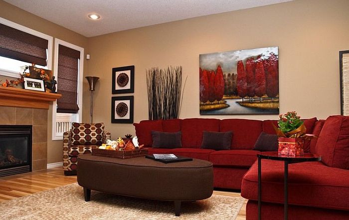 Red sofa - the compositional center of the living room