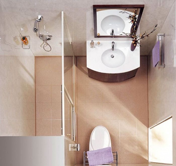 Разместить стеклянную душевую кабинку отличный вариант при декорировании крохотных площадей ванной комнаты.