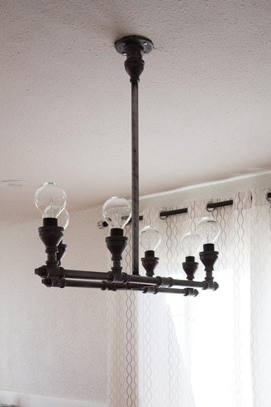 Чёрный дизайнерский светильник из труб - Фото 2