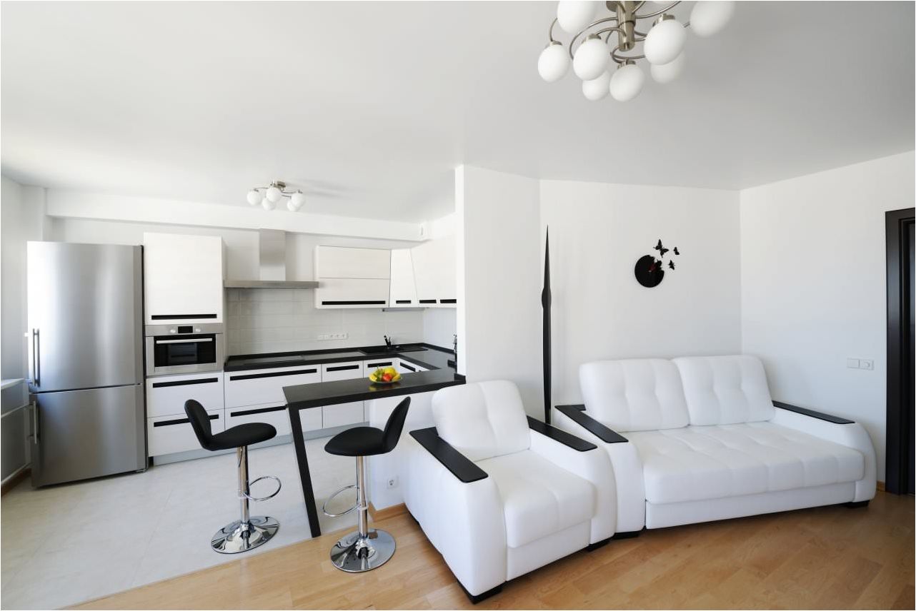 منضدة بار في تصميم غرفة معيشة مطبخ أبيض وأسود